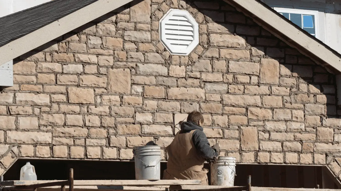 Beautiful outdoor masonry patio with stone fireplace